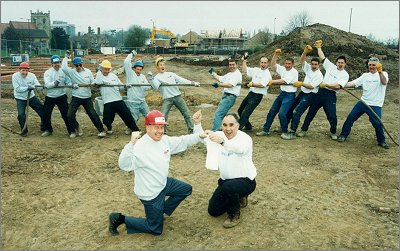 CLIVE BENFIELD (LEFT) AND BOB HALL SUPERVISE TUG OF WAR TRAINING - National Construction Week