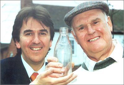Robert and Harry Shaw with one of the milk bottles
