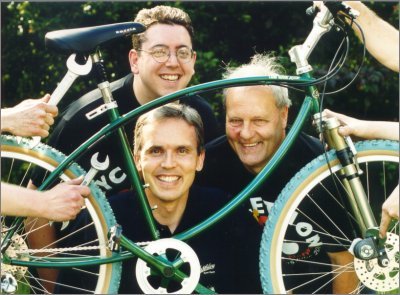 THE BIKE IS HANDED OVER BY ADRIAN WILLIAMS, OF PASHLEY'S (BOTTOM) AND JK STARLEY IV (RIGHT) TO CYCLETHON CO-ORDINATOR STUART JACKS (TOP)