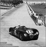 Stirling Moss racing in a Jaguar in 1952