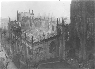 Coventry Cathedral smouldering after it was bombed