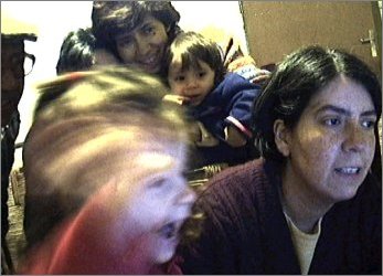 MIVI WAVING WITH BENITA (right), AUNTIE CECY WITH ELLIE, AND GRANDAD AND GRANDMA